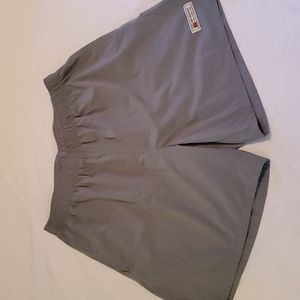 New Frontier men's athletic short. 4-way stretch. Unlined. Spruce green. Size L